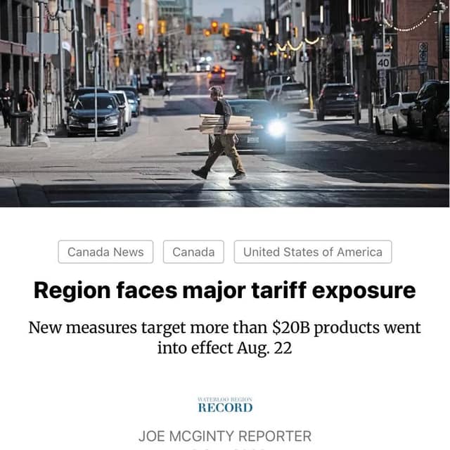 Screenshot of a Waterloo Region Record article headed "Region faces major tariff exposure," above a man carrying lumber across a city street.
