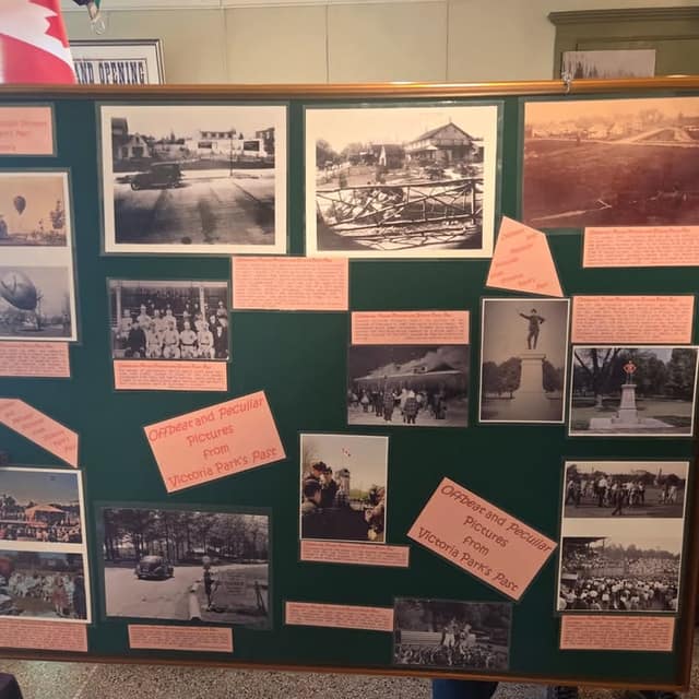 Green display board of old photos with pink labels reading Offbeat and Peculiar Pictures from Victoria Park's Past.