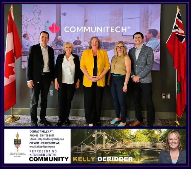 Five people stand smiling in a row before a Communitech screen, between a Canadian flag and an Ontario flag, with a contact banner below.